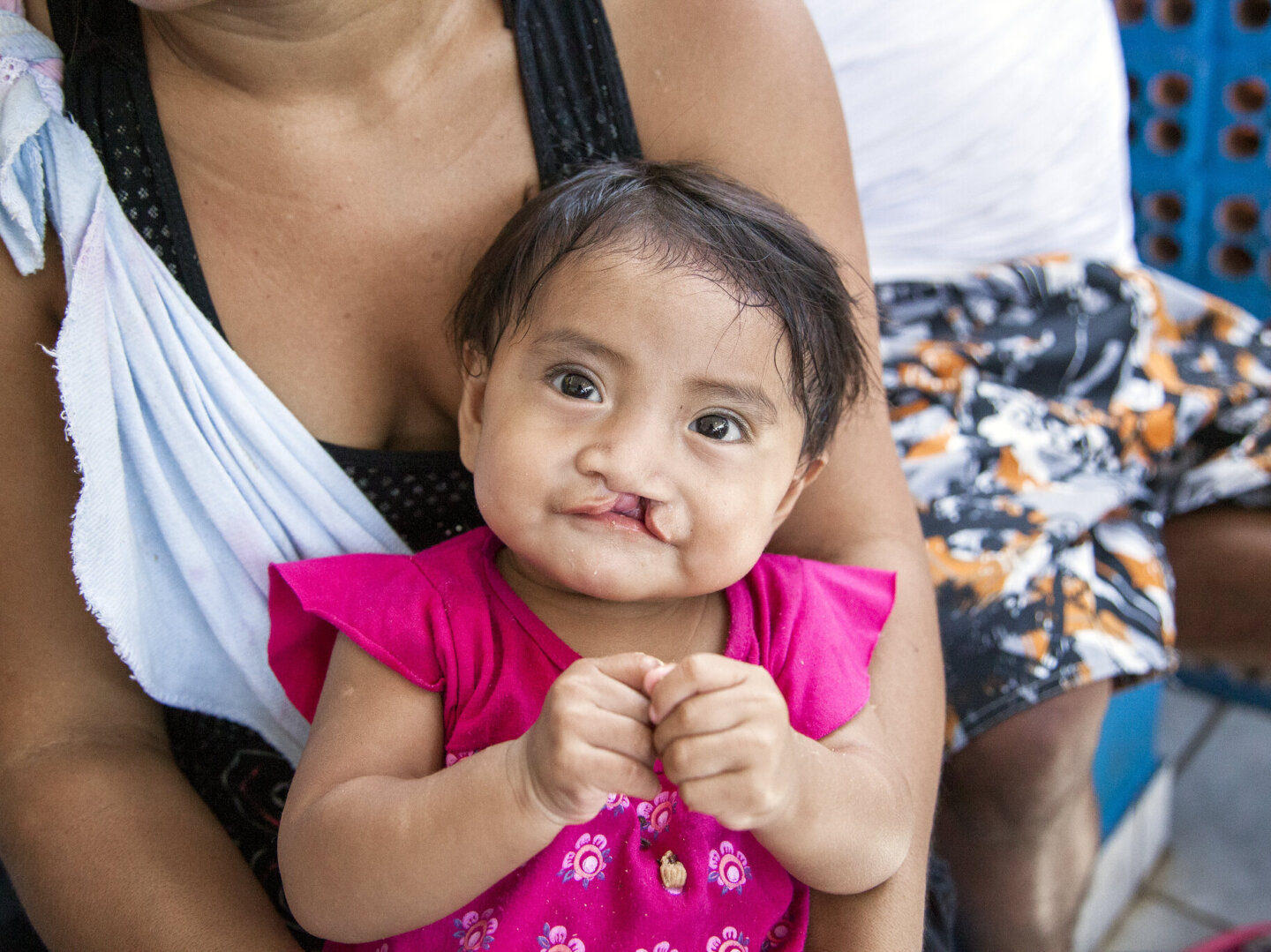 Elilaine looks at the camera.