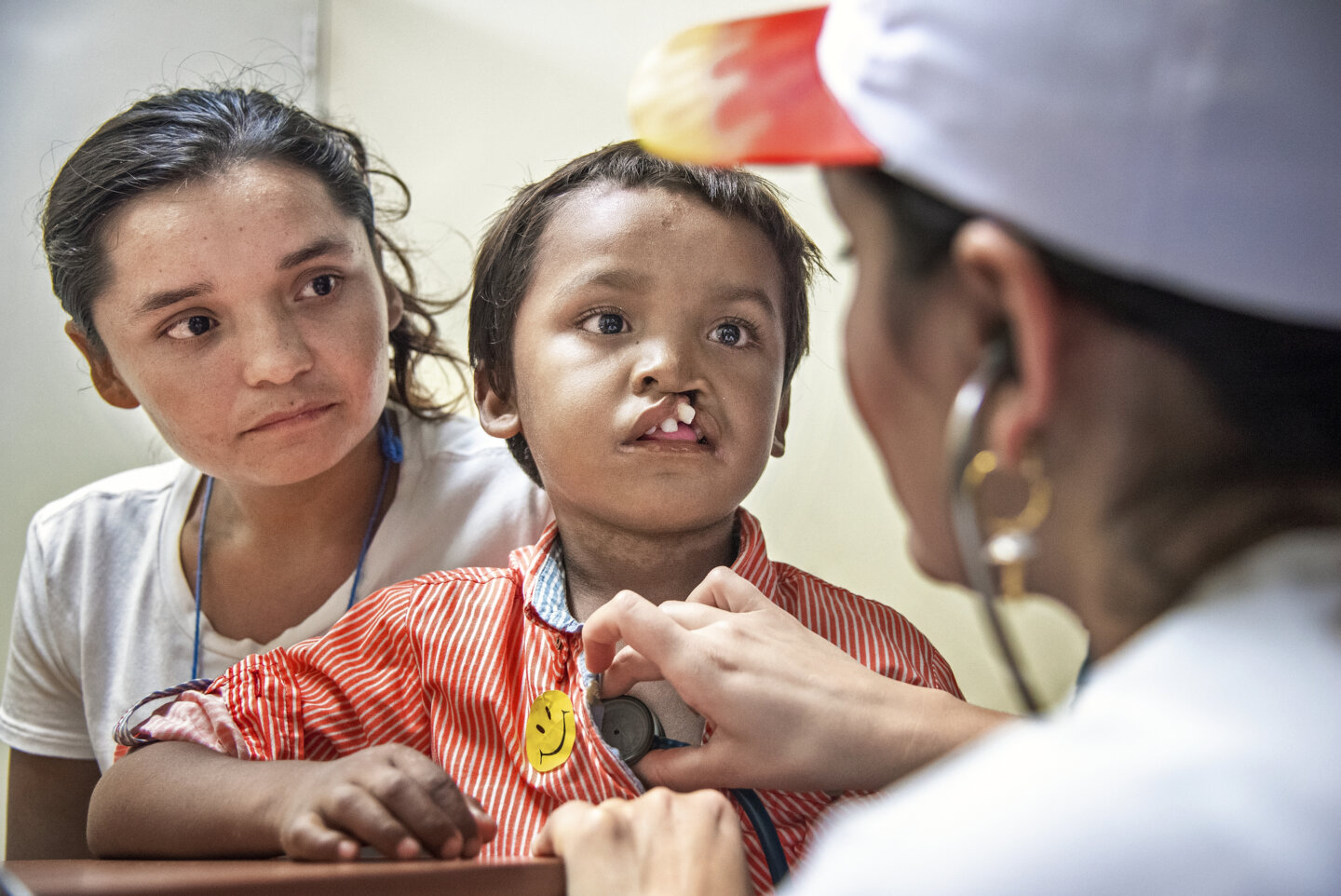Pedro has his vital signs checked by anesthesiologist Dr. Carolina Zapata.