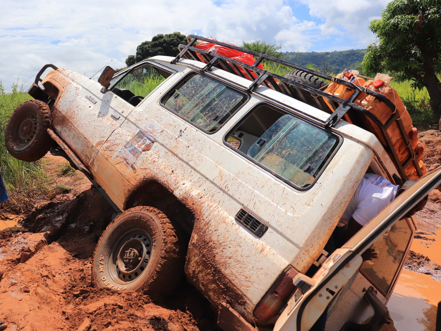 A vehicle from the DRC, stuck in the mud.