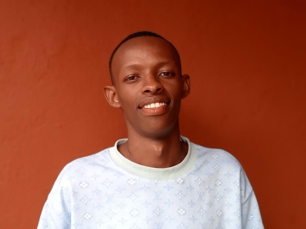 George smiles for the camera.