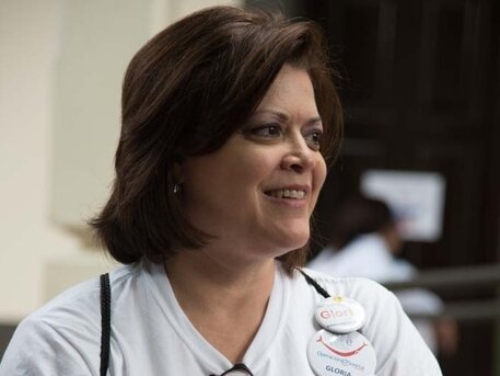 Gloria Vilches holds toys and supplies that she uses during her speech therapy sessions with Operation Smile patients.