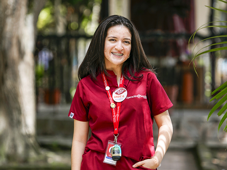 Angie smiles for the camera.