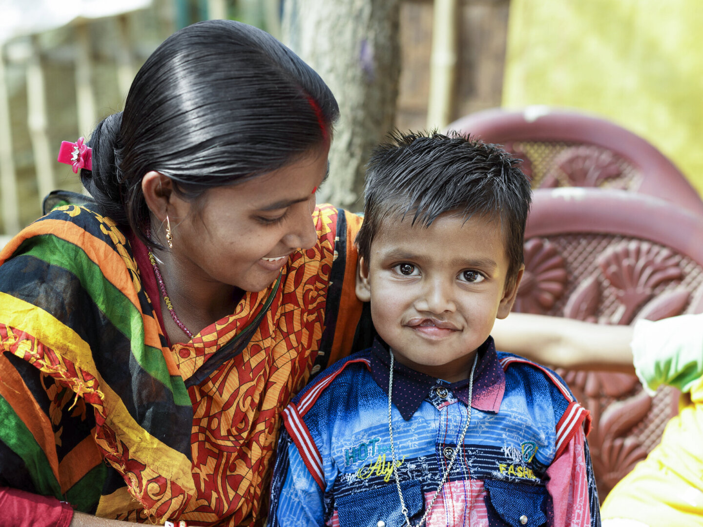 Shyam, before surgery, smiles for the camera.