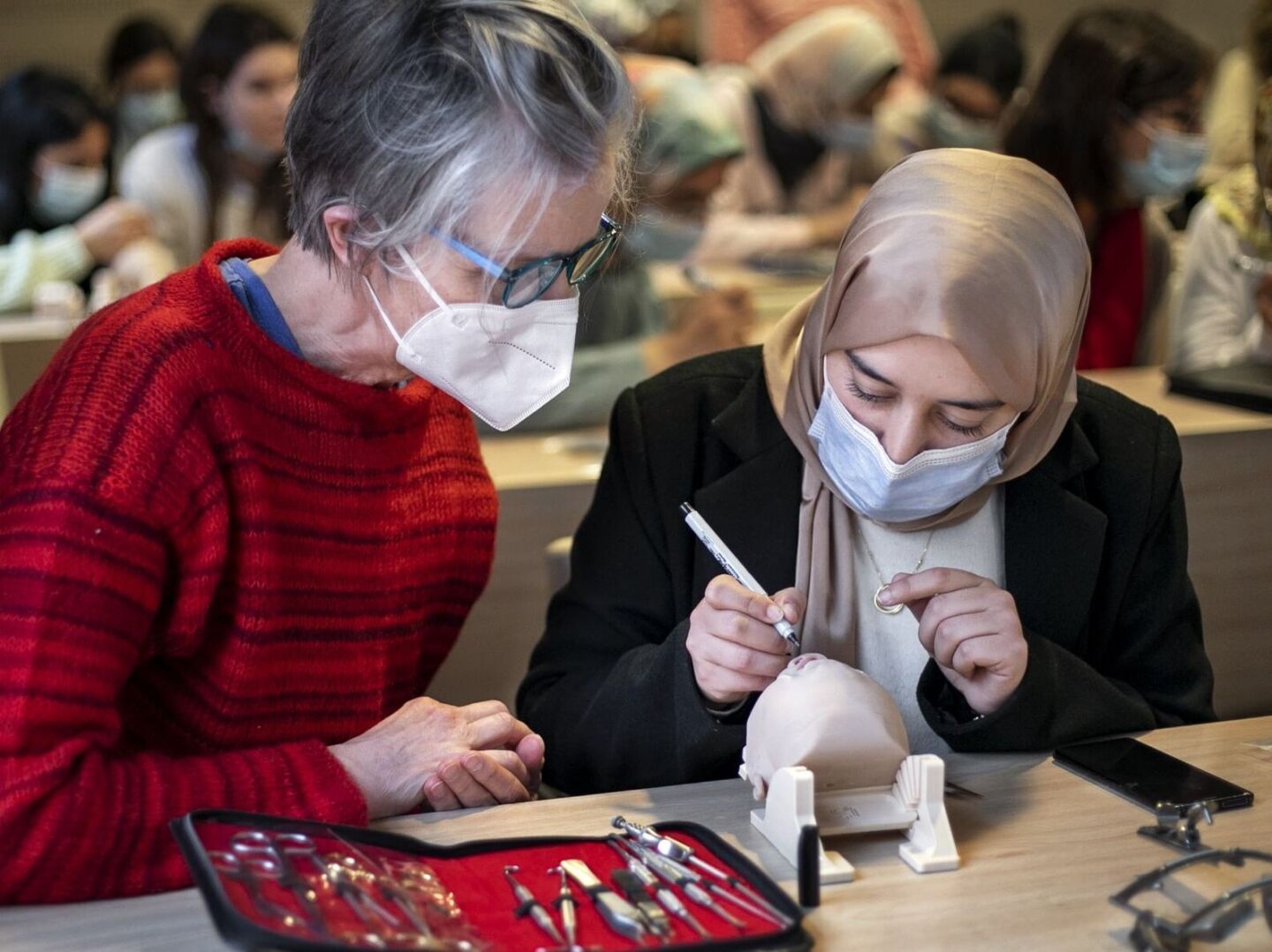 Surgeons discuss cleft repair techniques during the 2020 Women in Medicine surgical program in Morocco.