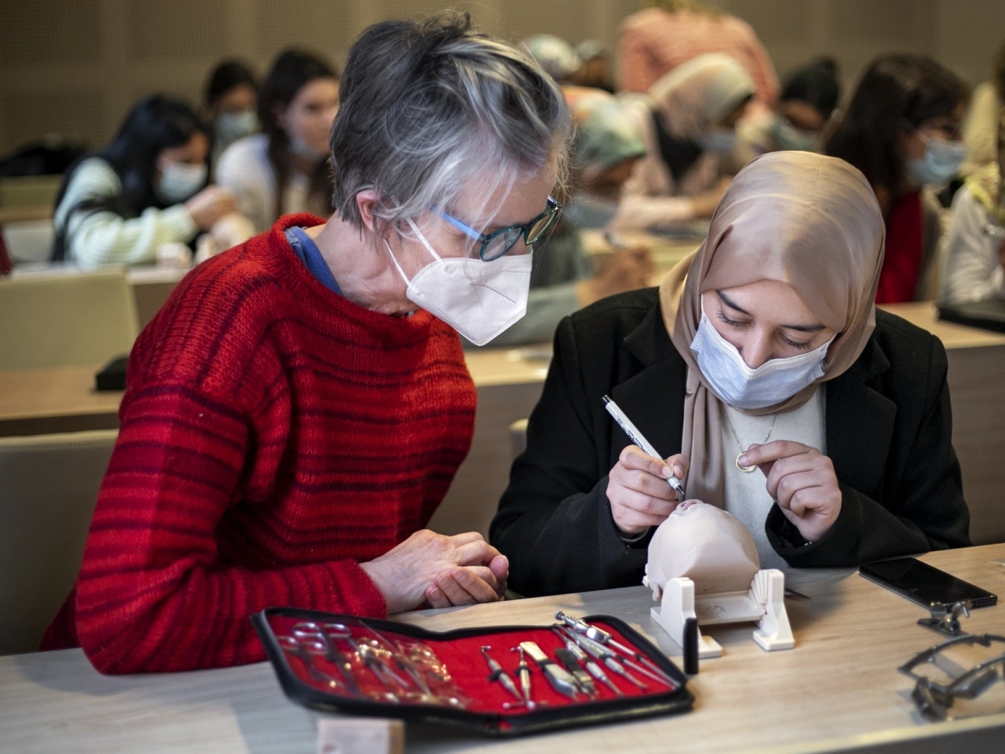 Surgeons discuss cleft repair techniques during the 2020 Women in Medicine surgical program in Morocco.
