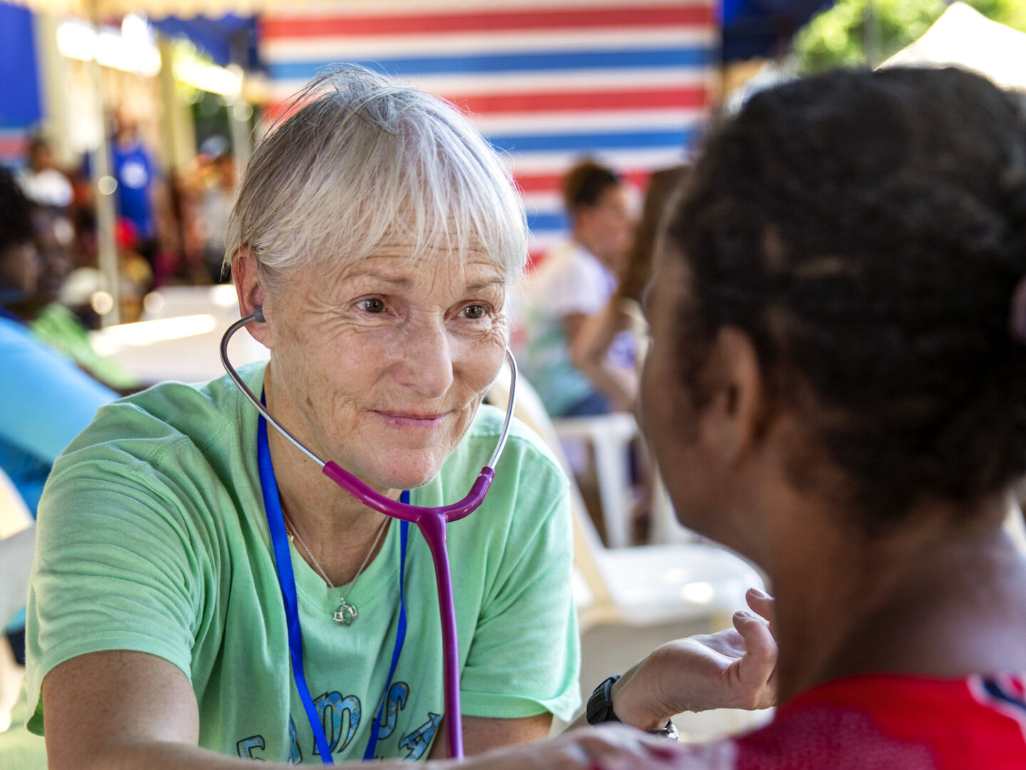 Nurse Anne Kristin Brodreskift examines a patient during a surgical program in Tamatave, Madgascar.