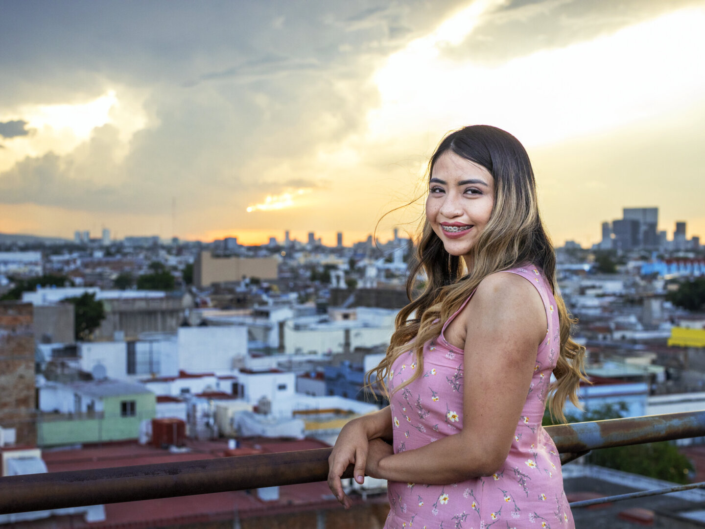 Andrea poses for a photo, years after surgery.