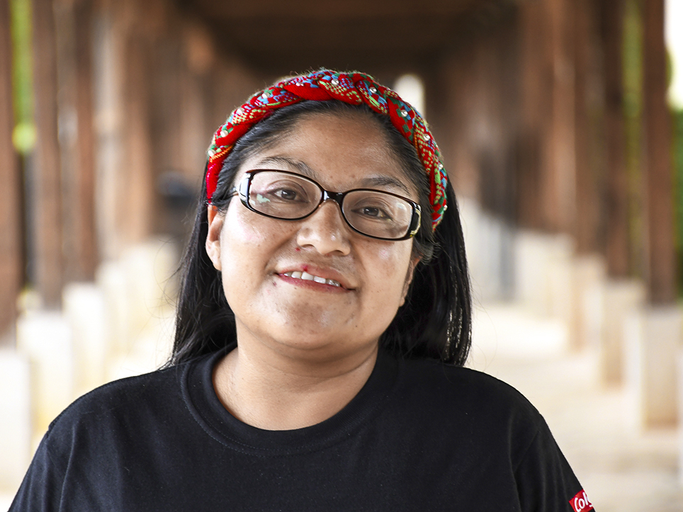 Volunteer Nurse Dominga smiles for the camera.