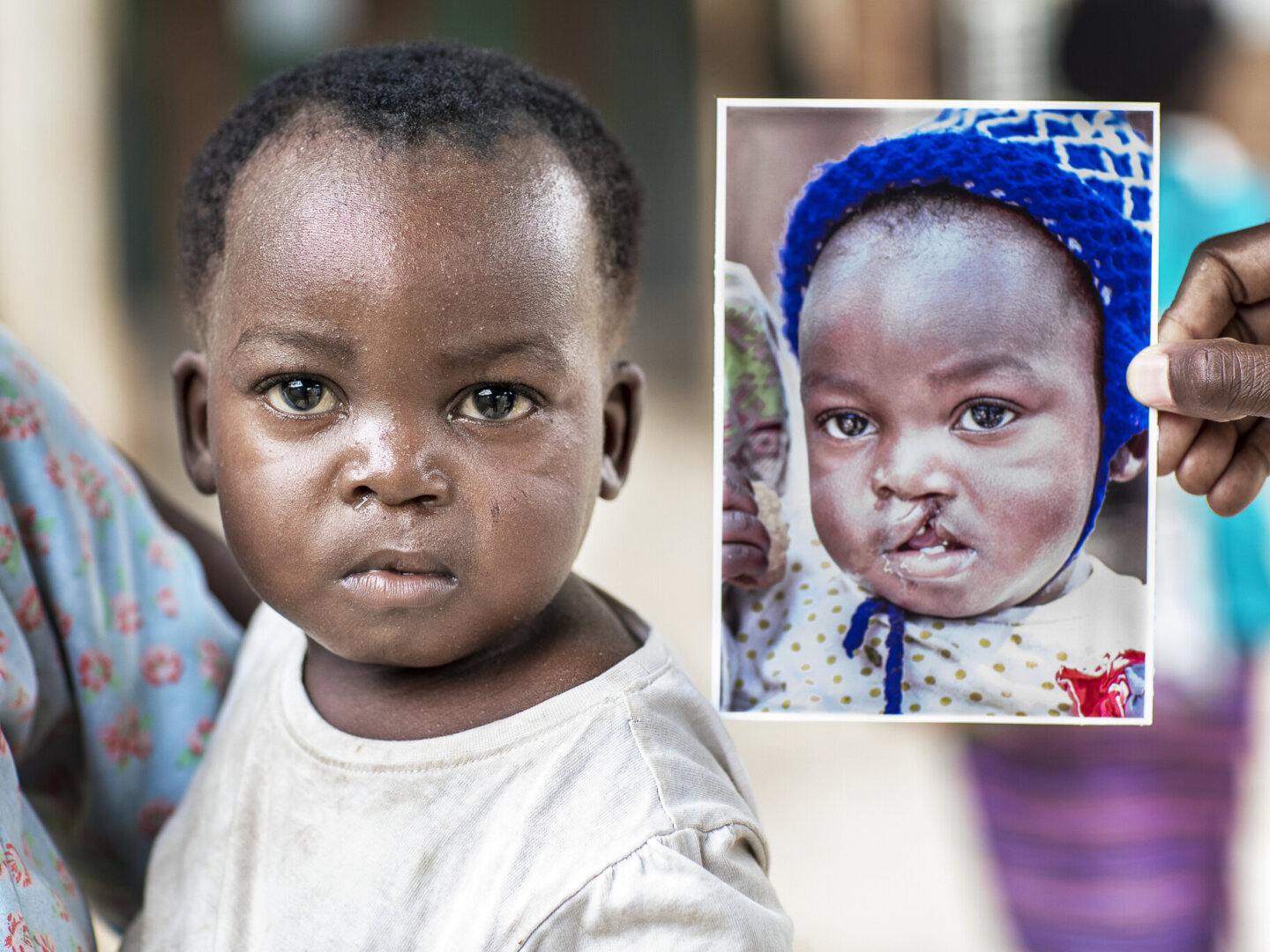 Sunday looks at the camera next to her before photo.