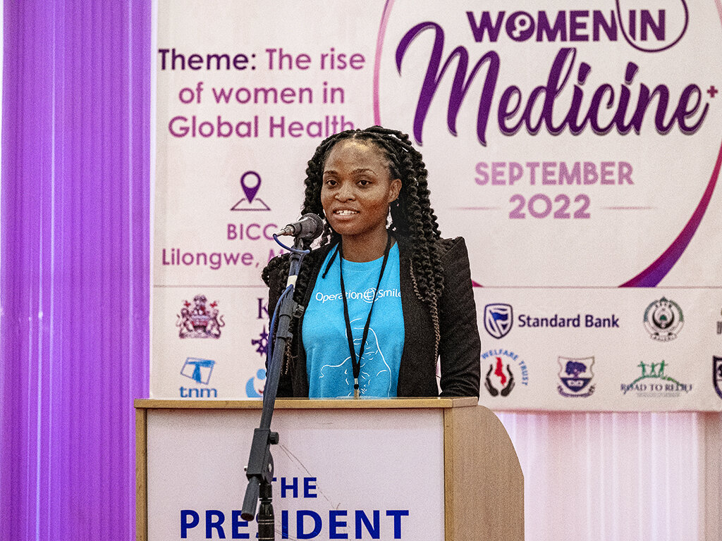 During Operation Smile Malawi's Women in Medicine surgical program in Lilongwe, guest speaker Carol Chigona shares her story of being born with a cleft condition and receiving care from the organization.