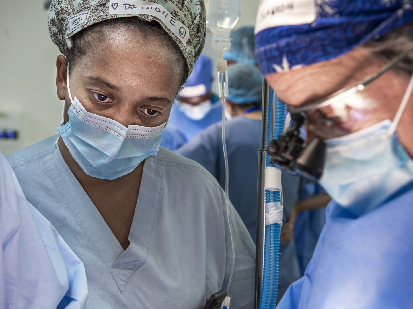 During an Operation Smile surgical program in Malawi, cleft surgeons Drs. Wone Banda of Malawi, left, and Benjamin Rodriguez of the U.S. perform surgery.