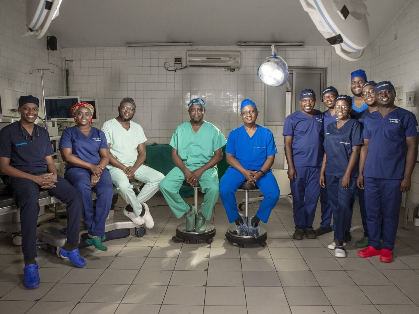 Certified plastic surgeons and plastic surgery residents gather for a photo in Kigali, Rwanda.