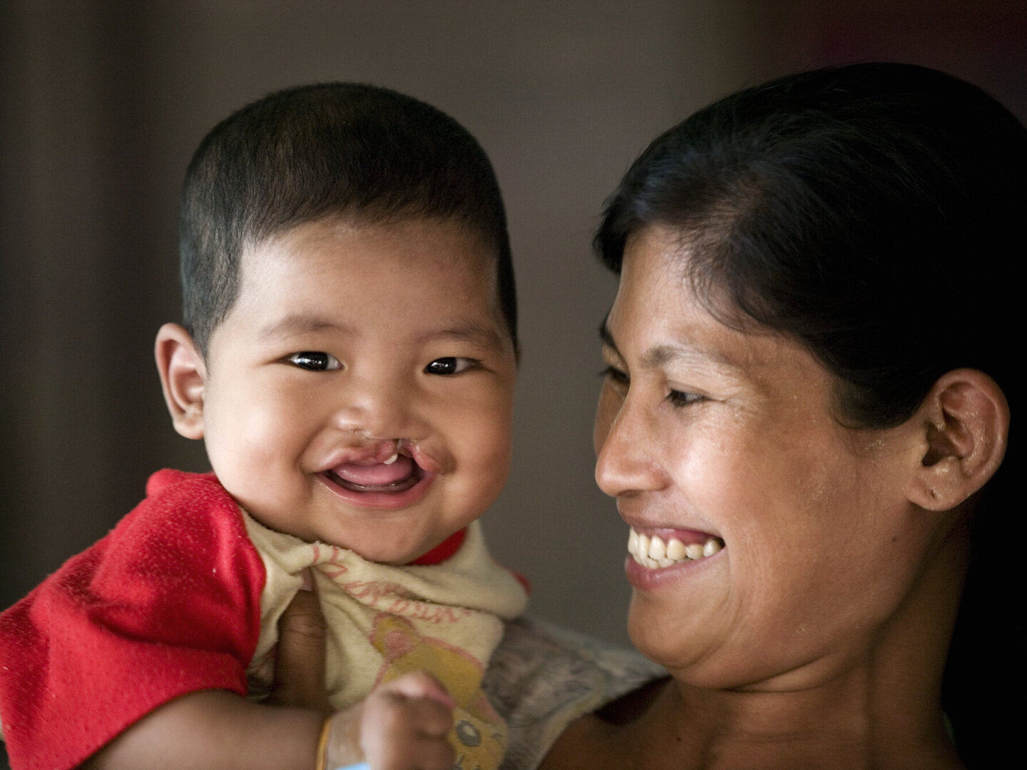 Han smiles for the camera before surgery during a surgical program in 2006 in Thailand.