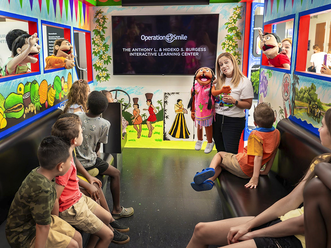 Kids enjoy a puppet show during a tour of the Interactive Learning Center.