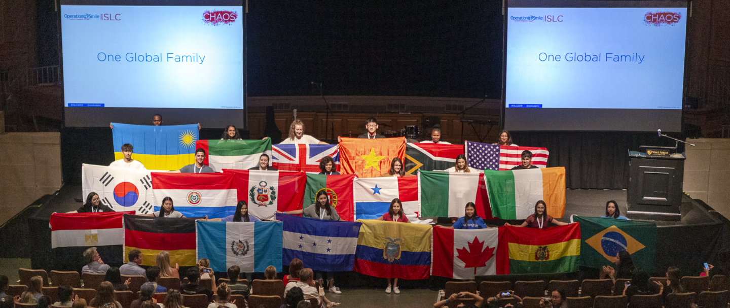 Students share flags from their countries during the 2019 International Student Leadership Conference.