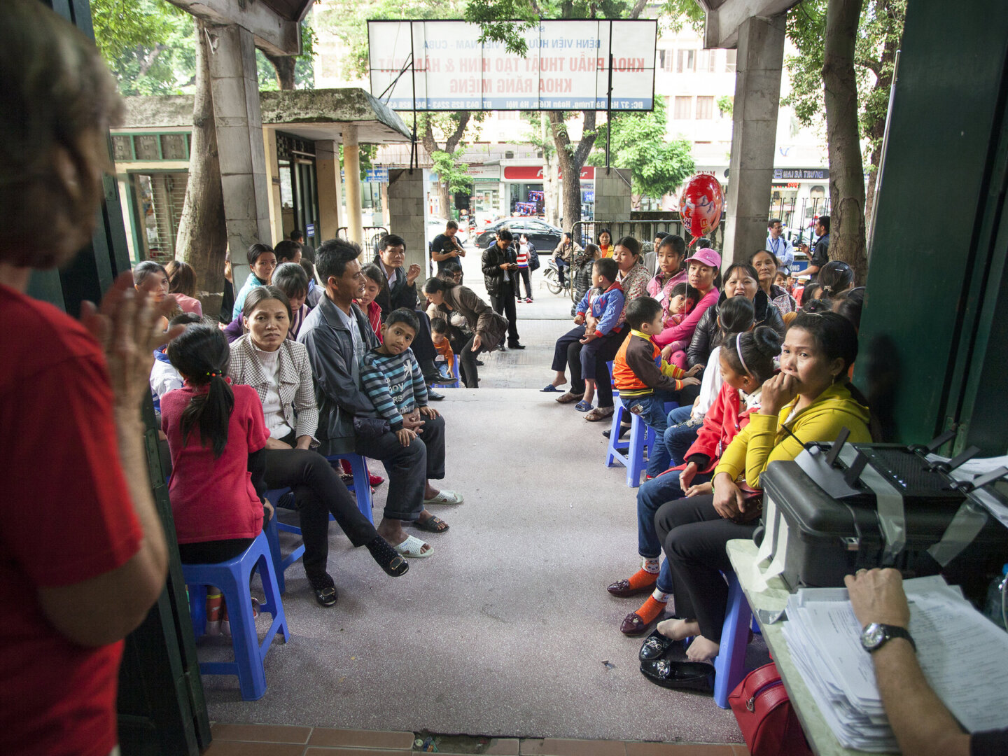 A group gathers during a surgical program in 2014 in Vietnam.