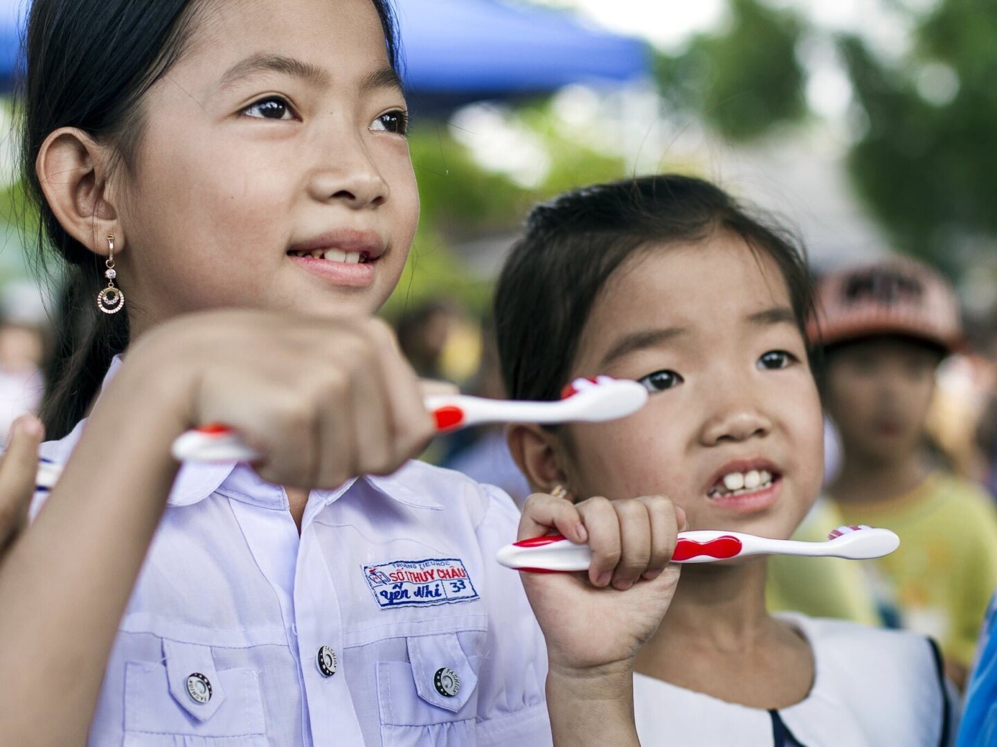 Students learn about dental hygiene during a program in Hue, Vietnam. Oral health is a key pillar of Operation Smile's comprehensive care.