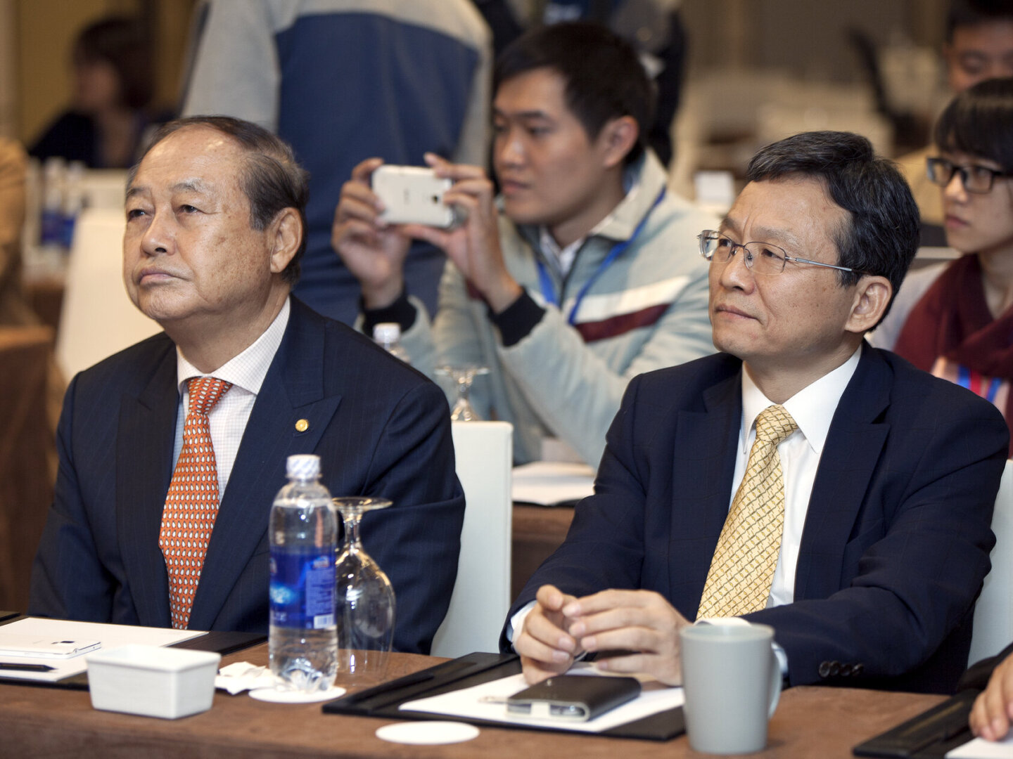 Chun Byungsuk, director general of strategic marketing at the Korea-Trade Investment Promotion Agency and Soonpyo Chyun, president of CESCO and chairperson of Operation Smile Korea, sit together at a meeting in 2014 in Vietnam.