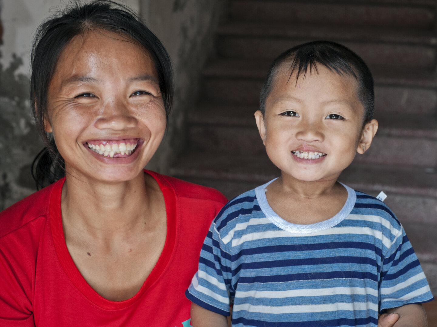 Bui and his mom smile for the camera, after his surgery.