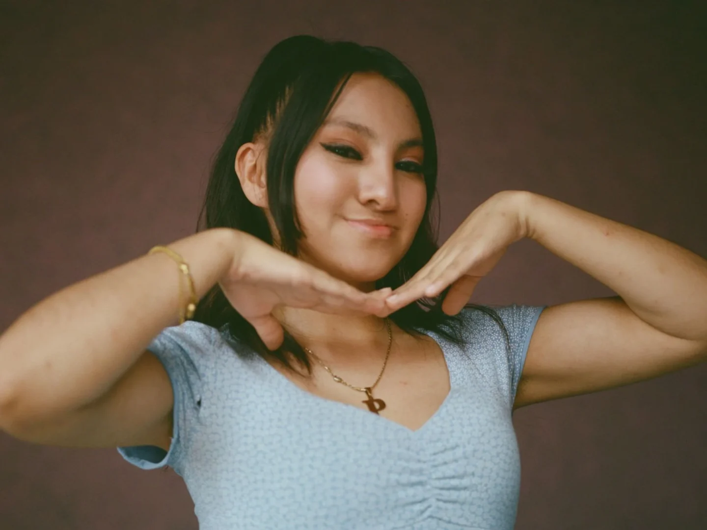 Palisha smiles for the camera.