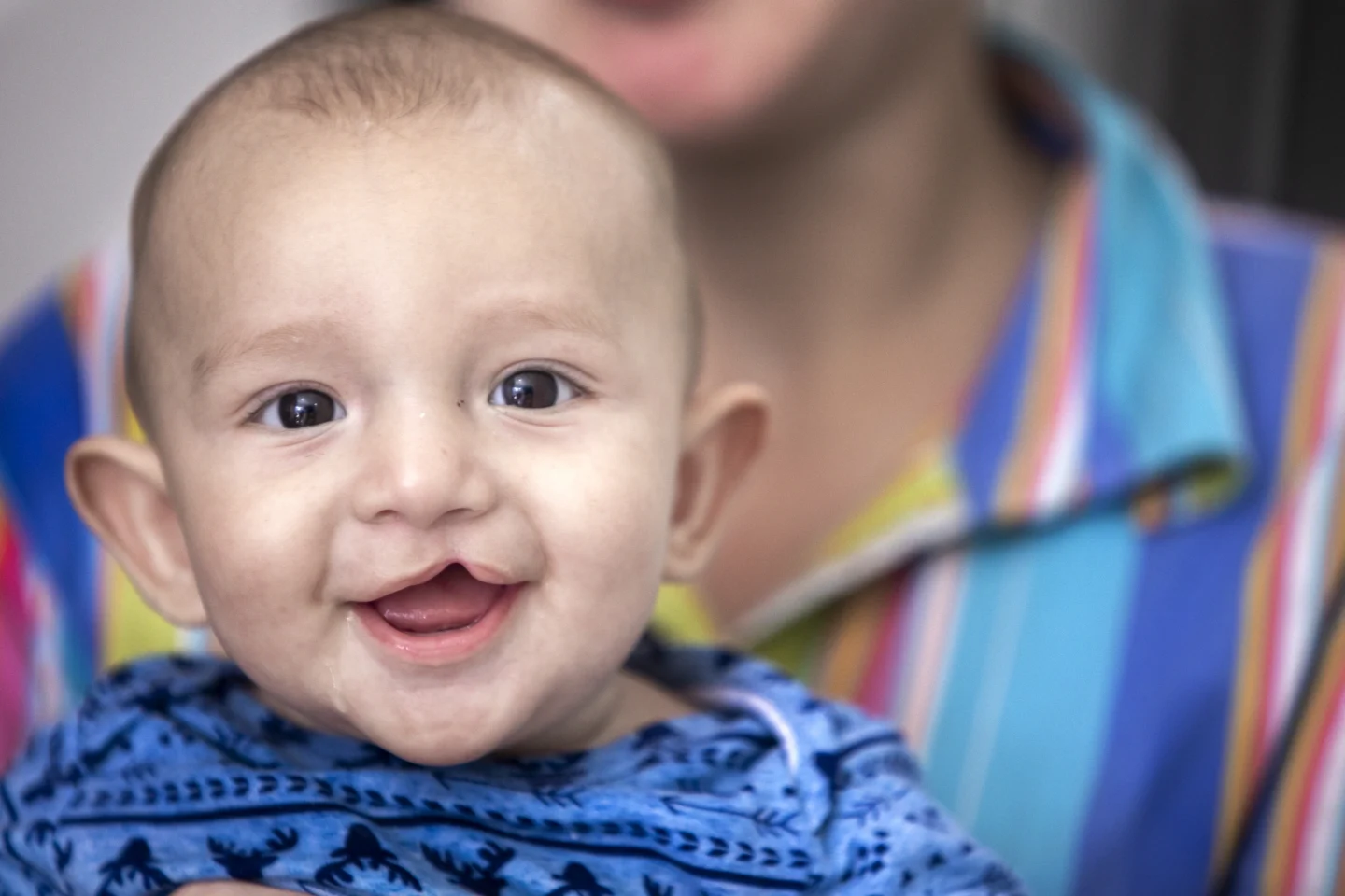 Samuel looks at the camera.