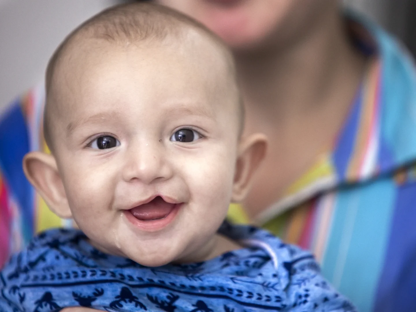 Samuel looks at the camera.