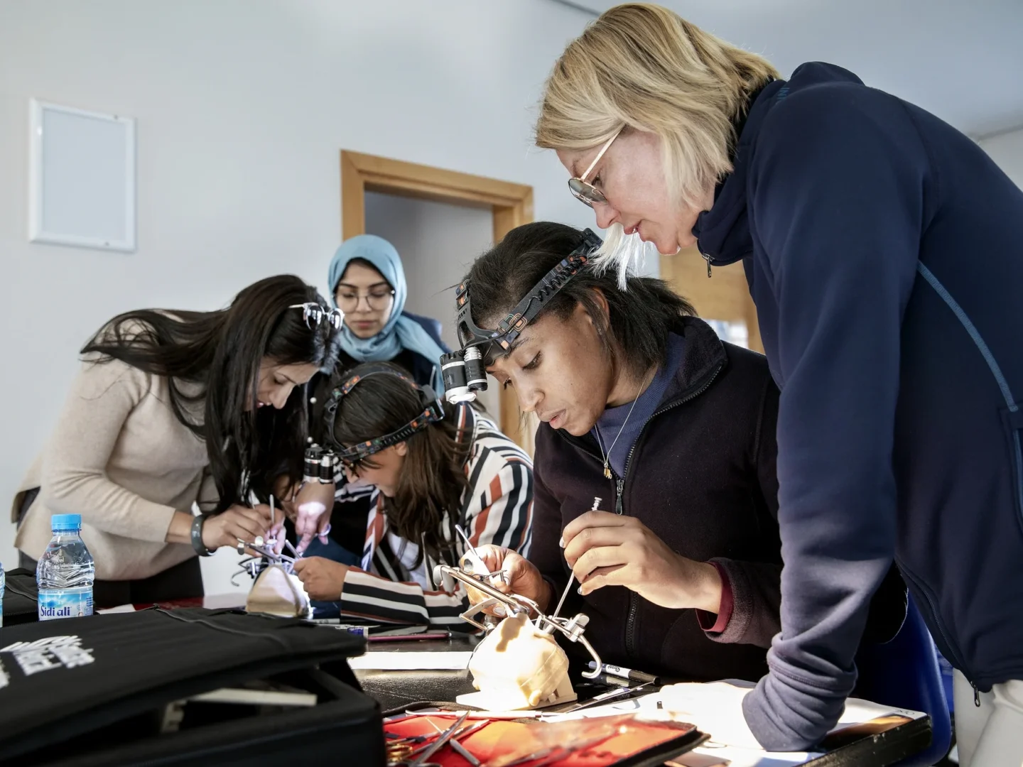 Mentors and mentees work together during a training.