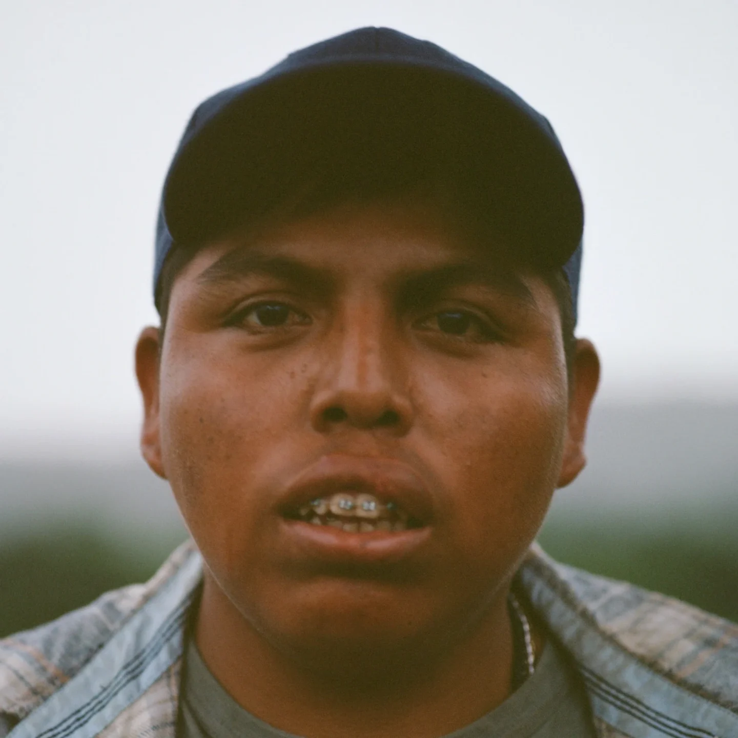 Reginaldo looks into the camera.